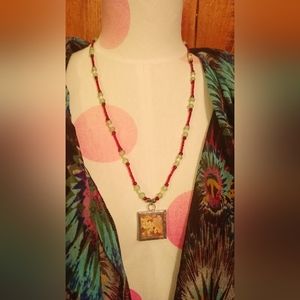 Tiffany's Unique Jewelry (silver charm necklace)